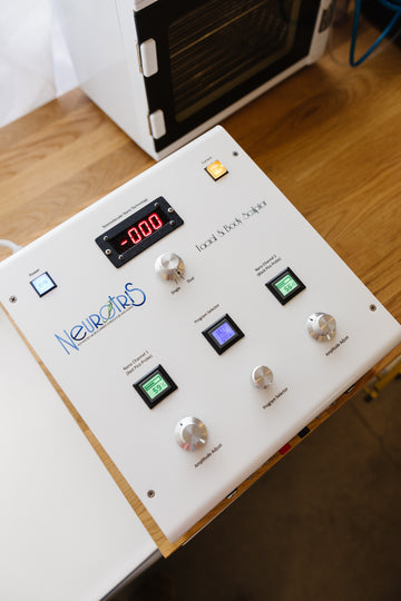 Neurotris Facial and body sculptor device on counter in estheticians office