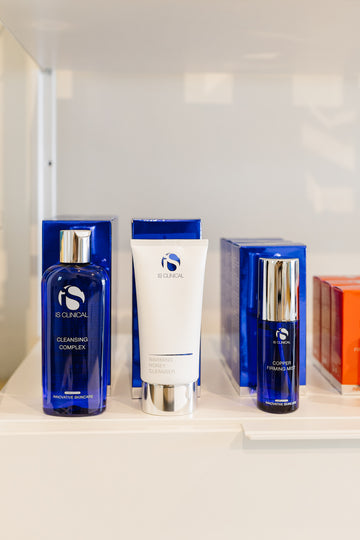 iS Clinical products on a shelf with a neutral background